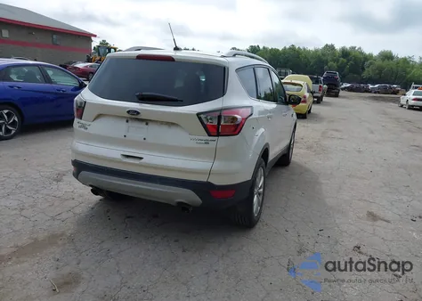 2017 Ford Escape Titanium z USA, uszkodzony, nr VIN 1FMCU9J92HUA73499